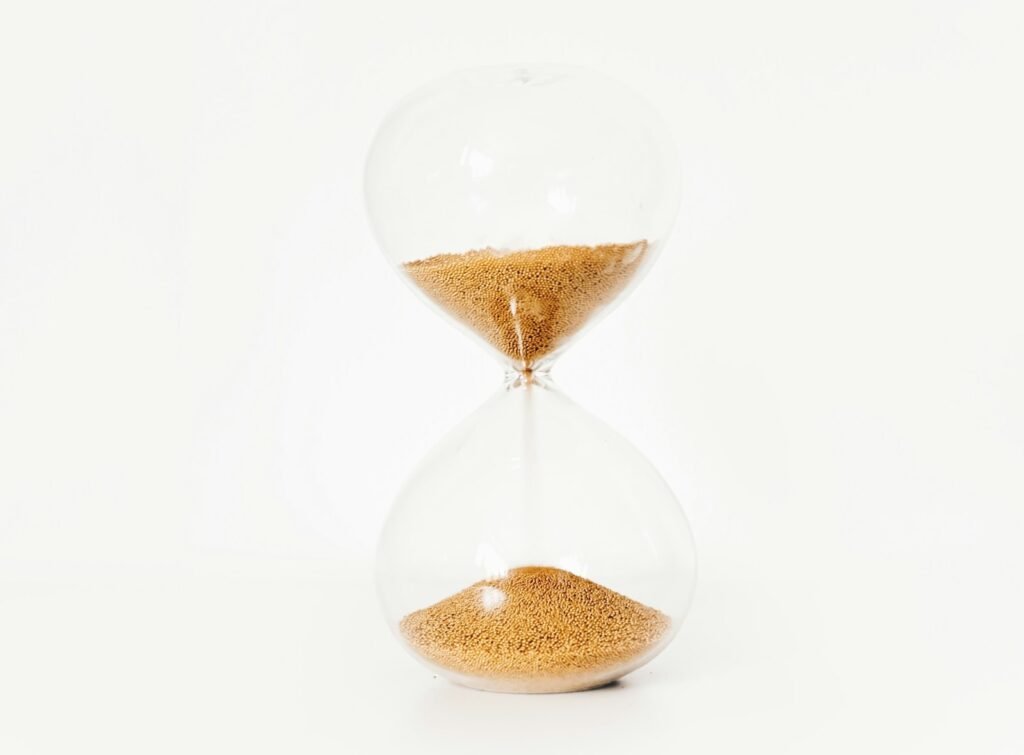 Hourglass on a soft grey background